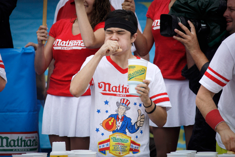 Illustration for article titled The Grossest Photos From The Nathan's Hot Dog Eating Contest